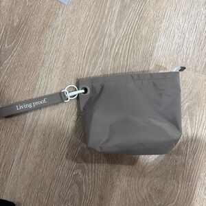 Living proof Grey and white zipper pouch with adjustable strap #accessories